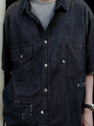 USAGE Distressed Short Sleeve Denim Shirt in Gray - On Male Model
