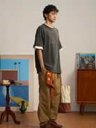 SOD Belted Cotton Nylon Tapered Pants in Beige - On Male Model