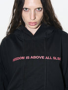 BLINDNOPLAN Faux Double Layer Paneled Hoodie in Black - On Female Model