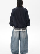MASONPRINCE Lightweight Tonal Check Nylon Jacket in Navy Blue - On Model