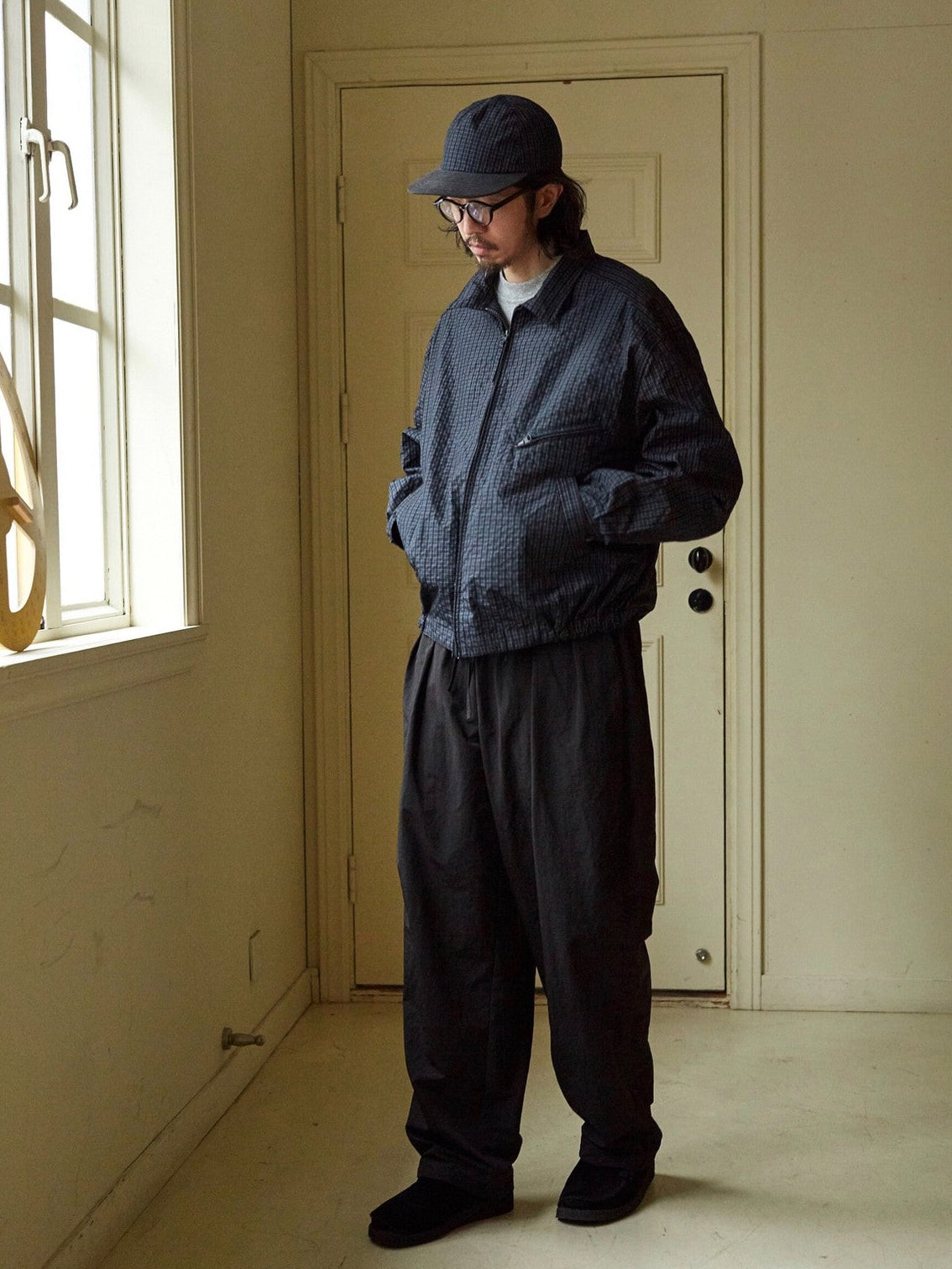 USAGE Jacquard Check Harrington Jacket in Navy Blue - On Male Model