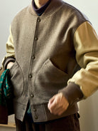 USAGE Reversible Velvet Leather Varsity Jacket in Beige - On Male Model