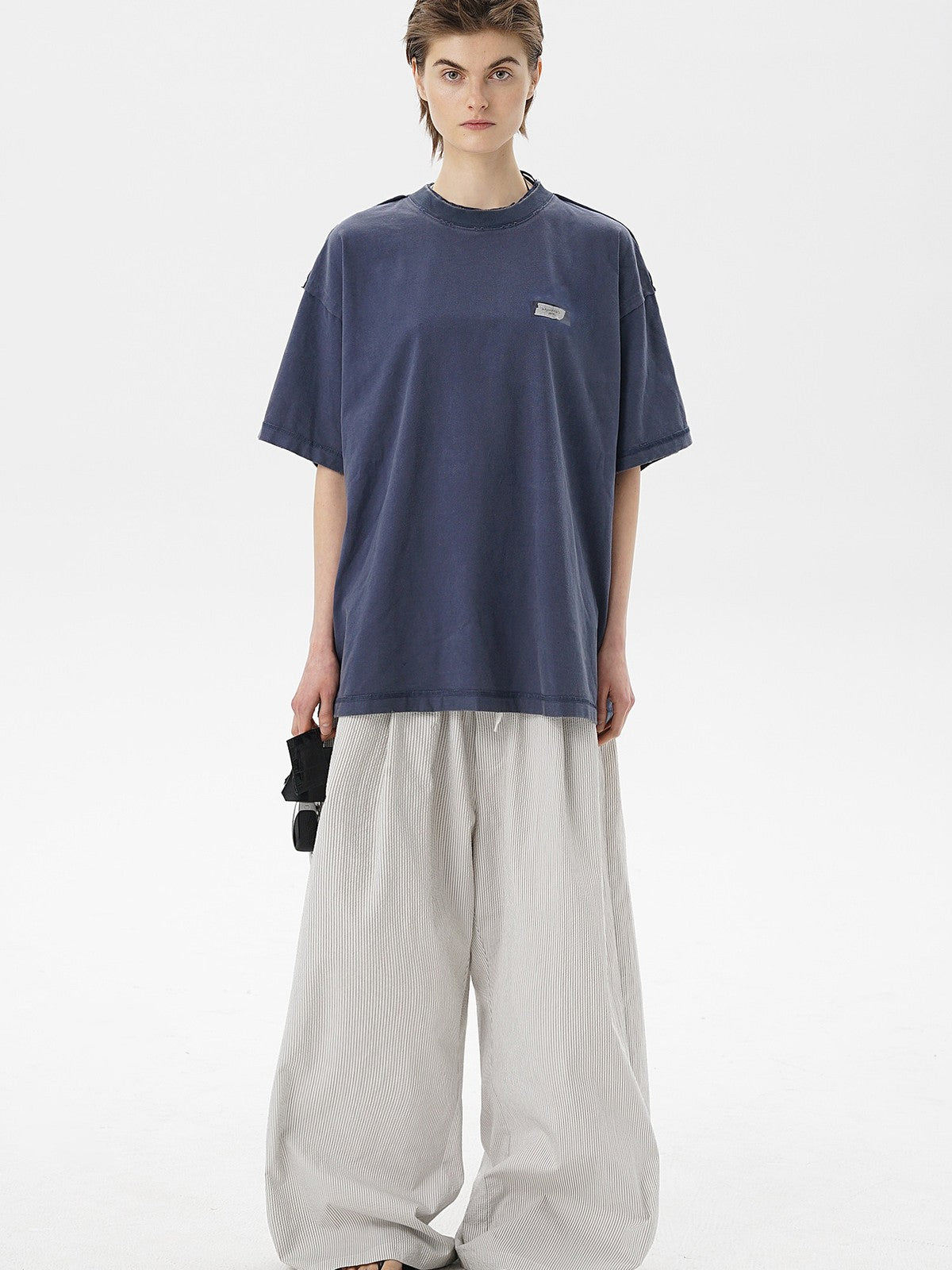 MASONPRINCE Exposed Seam Tape Print T Shirt in Navy Blue - On Female Model