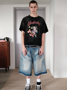 UNKNOWNWORLD Distressed Wash Baggy Shorts in Blue - On Male Model