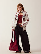 BEERBRO Varsity Patch Zip Up Cardigan in Off-White - On Female Model