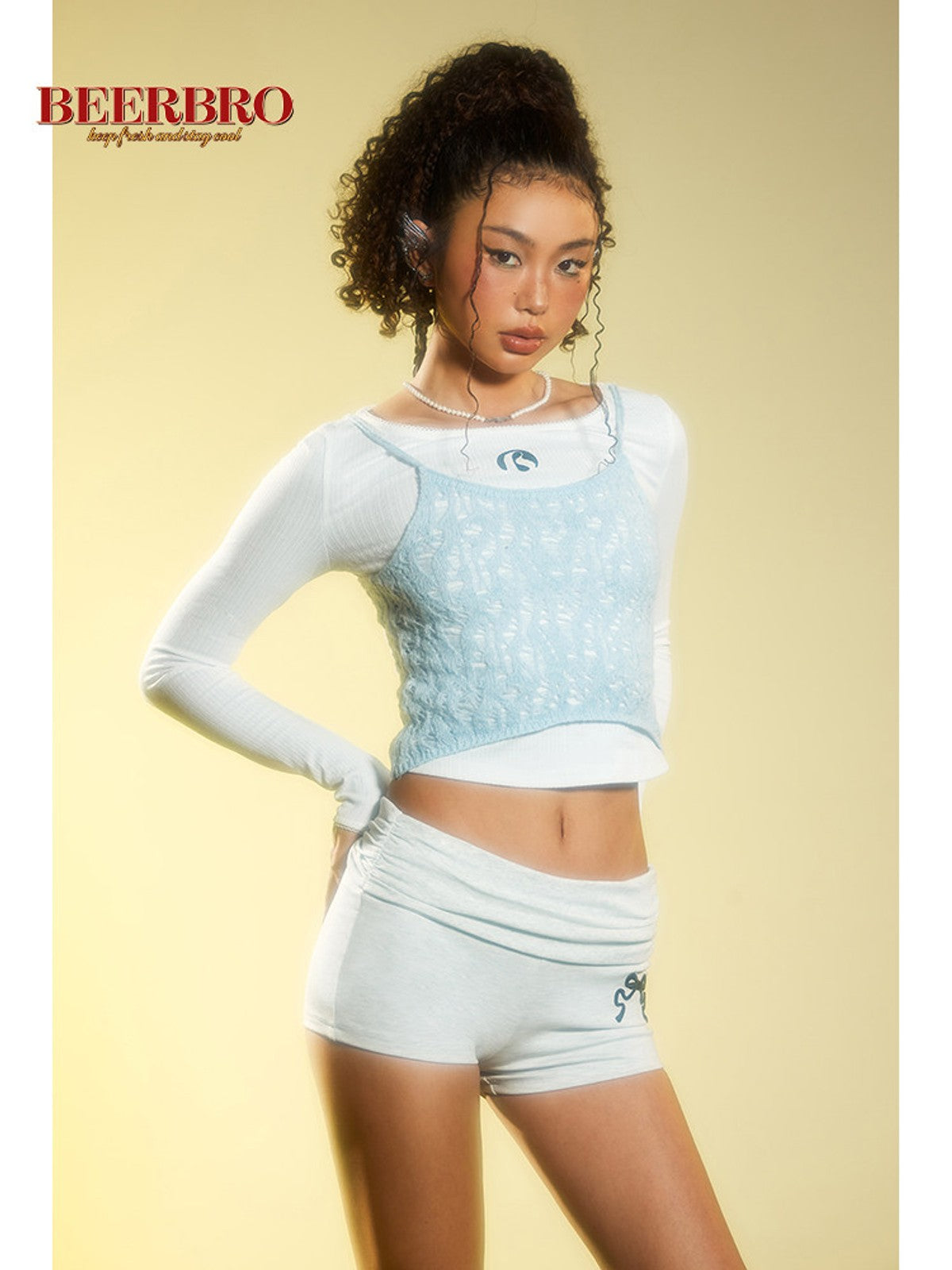 BEERBRO Ribbed Embroidered Long Sleeve Top in White - On Female Model