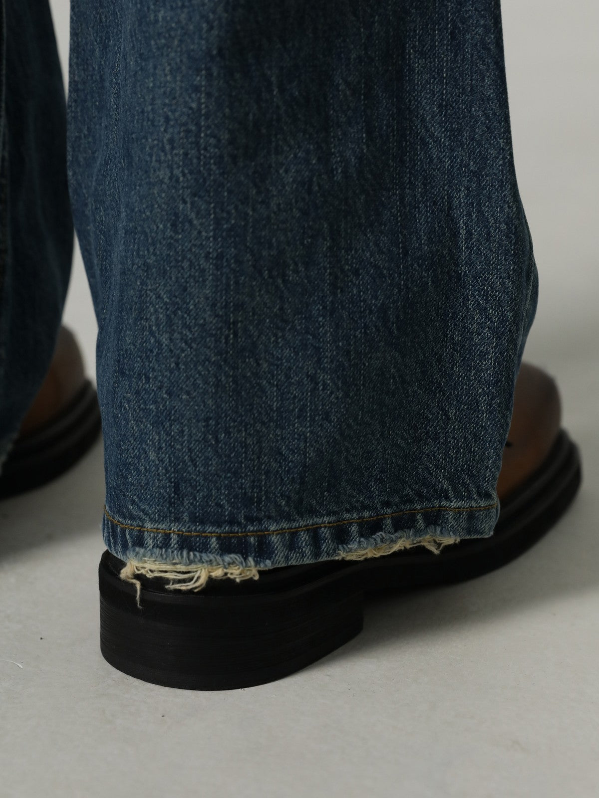MASONPRINCE High Waisted Distressed Flared Jeans in Navy Blue - On Model
