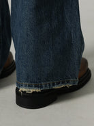 MASONPRINCE High Waisted Distressed Flared Jeans in Navy Blue - On Model