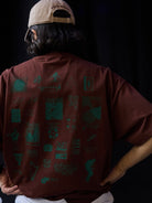USAGE JZ Festival Graphic Cotton T Shirt in Brown - On Model