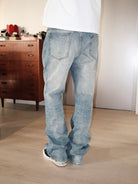 UNKNOWNWORLD Ice Blue Washed Micro Flare Jeans in Blue - On Model