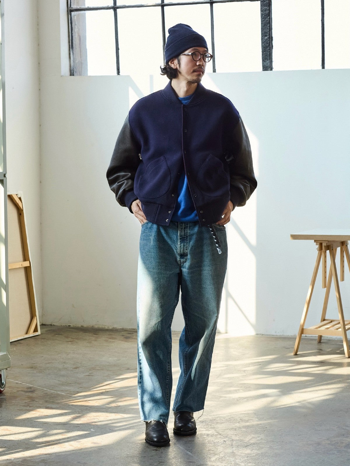USAGE Reversible Velvet Leather Varsity Jacket in Navy Blue - On Male Model