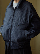 USAGE Jacquard Check Harrington Jacket in Navy Blue - On Male Model