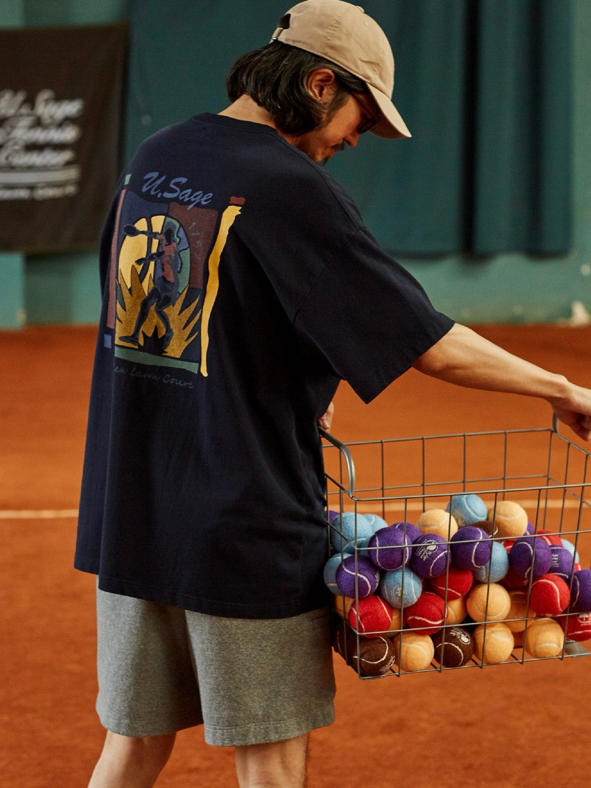 USAGE Retro Tennis Graphic Cotton T Shirt in Navy Blue - On Male Model