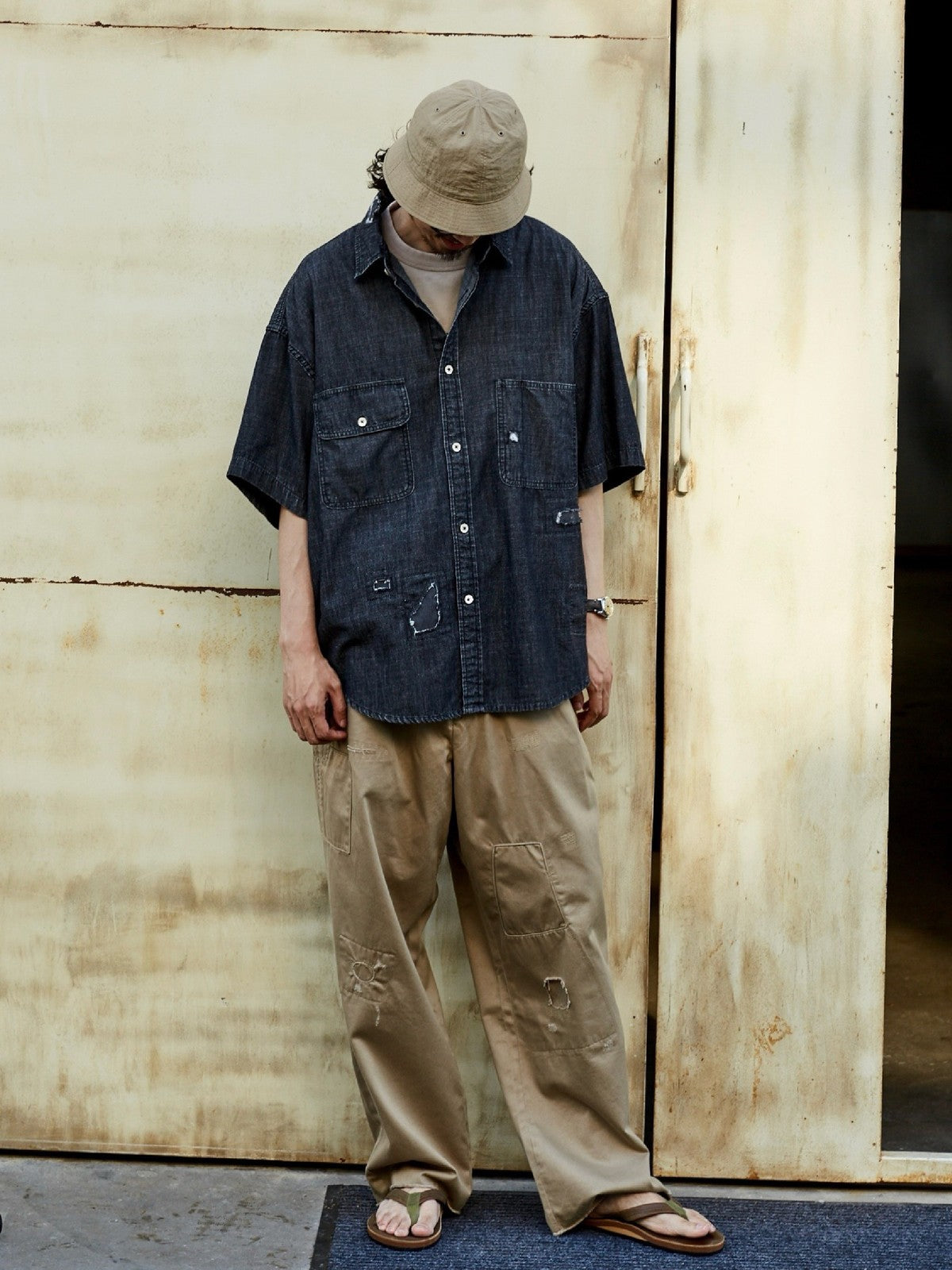 USAGE Distressed Short Sleeve Denim Shirt in Gray - On Male Model