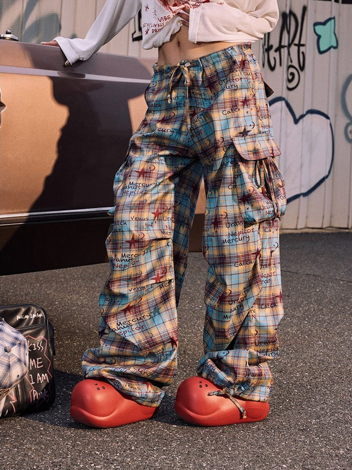 BeerBro Graffiti Plaid Strap Cargo Pants in Sky Blue - On Female Model