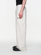 BLINDNOPLAN Metallic Logo Zip Hoodie Pants Set in White - On Male Model