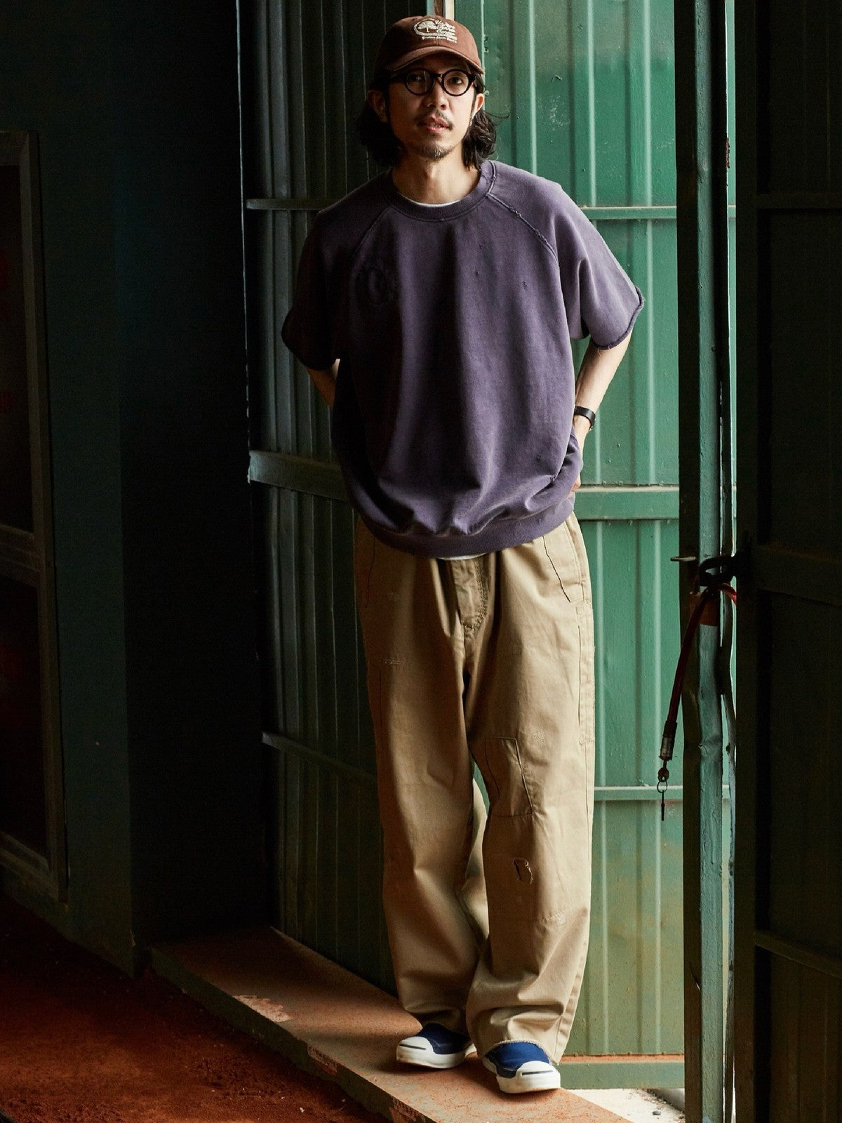USAGE Vintage Wash Distressed Short Sleeve Sweatshirt in Purple - On Male Model