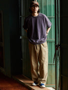 USAGE Vintage Wash Distressed Short Sleeve Sweatshirt in Purple - On Male Model