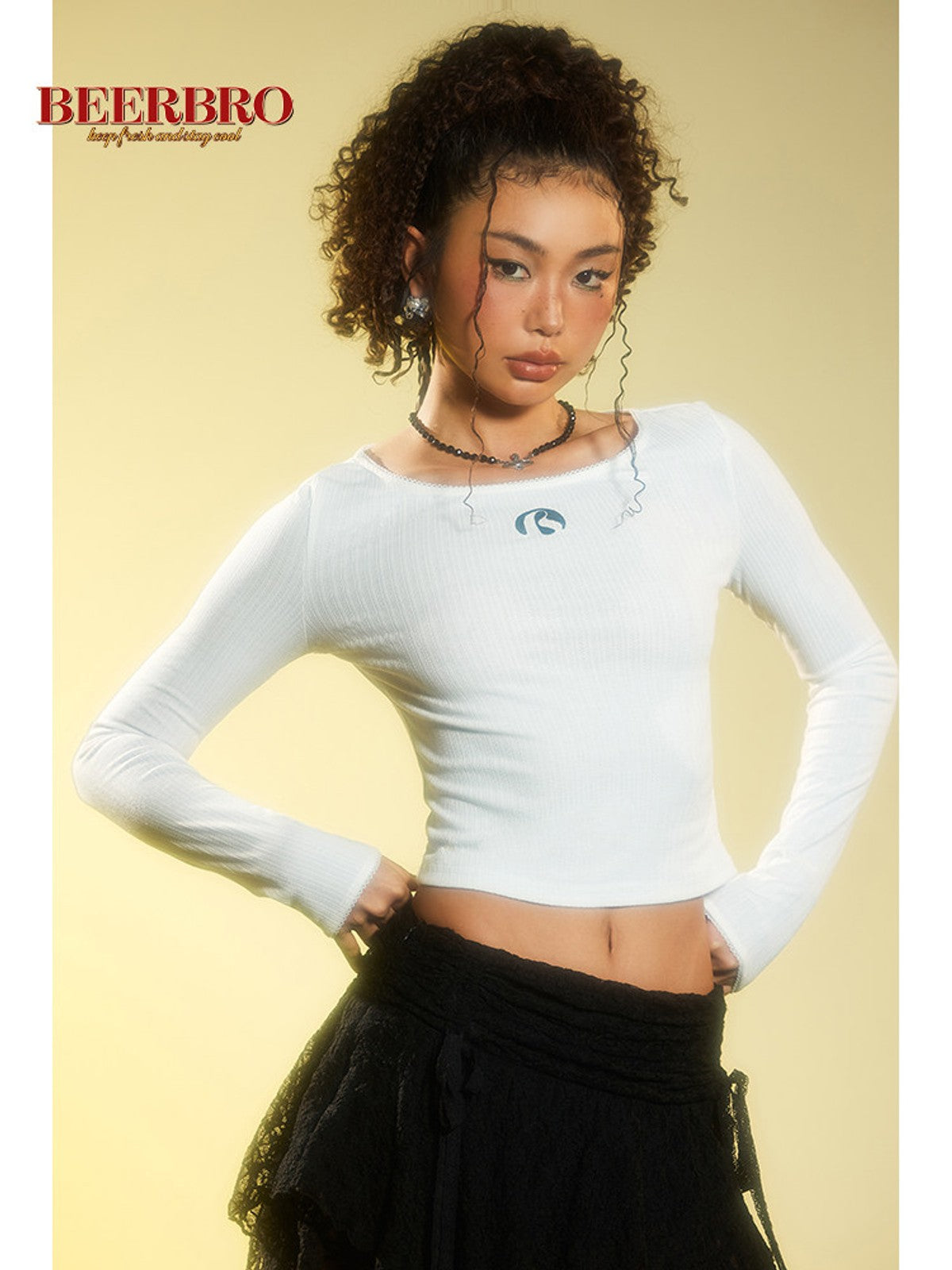 BEERBRO Ribbed Embroidered Long Sleeve Top in White - On Female Model