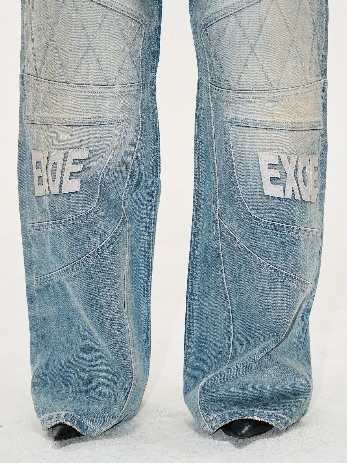 BLINDNOPLAN Paneled Embroidered Distressed Denim Pants in Blue - On Model