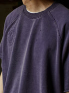 USAGE Vintage Wash Distressed Short Sleeve Sweatshirt in Purple - On Male Model