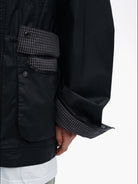 MASONPRINCE Waxed Cotton Barn Jacket in Black - On Model