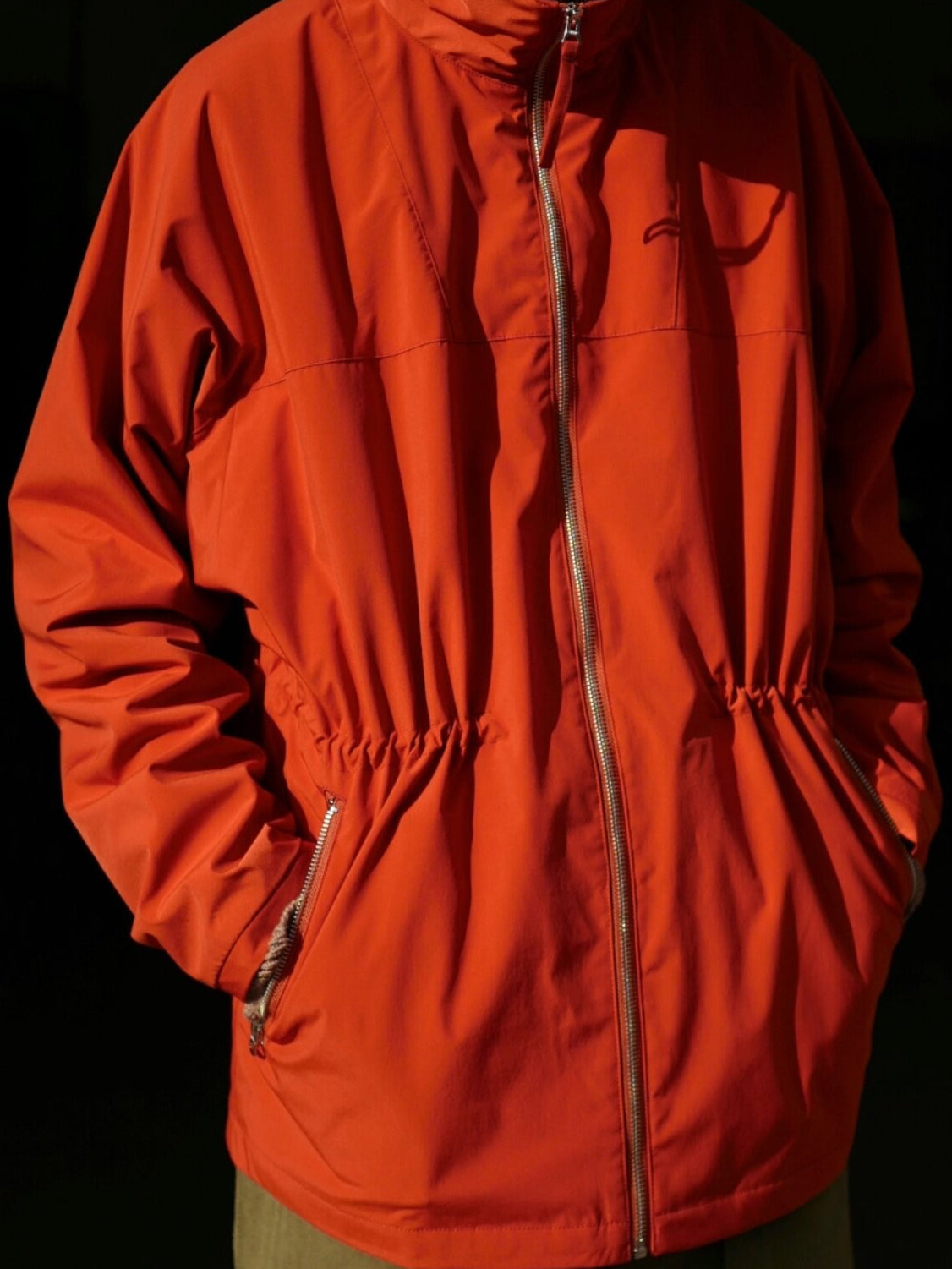 USAGE Drawstring Zip Front Tech Anorak in Orange - On Male Model