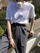 MASONPRINCE Pleated Wide Leg Trousers in Gray - On Female Model