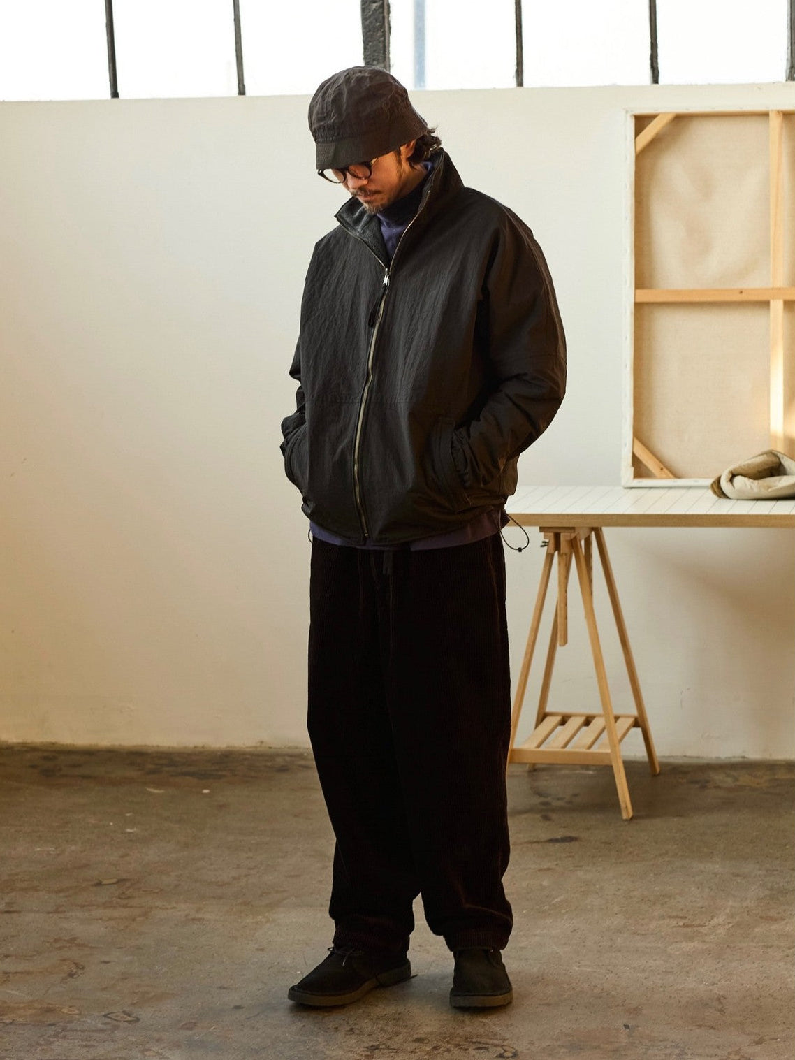 USAGE Reversible Nylon Fleece Track Jacket in Black - On Male Model