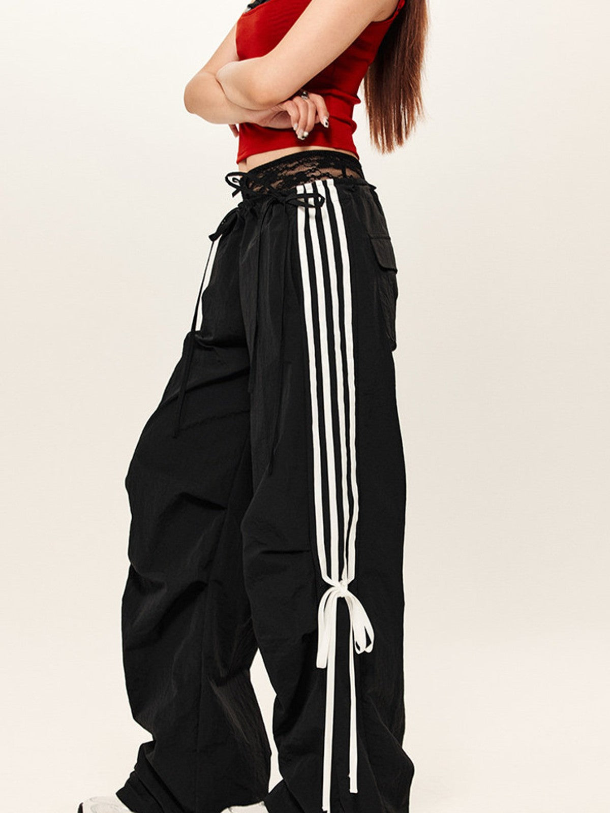 BEERBRO Drawstring Wide Leg Parachute Pants in Black - On Female Model