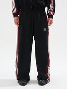 BLINDNOPLAN Raw Edge Contrast Paneled Sweatpants in Black - On Model