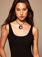 BEERBRO Scoop Neck Low Back Bodysuit in Black - On Female Model