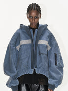 BLINDNOPLAN Distressed Hooded MA 1 Bomber Jacket in Blue - On Female Model