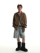 MASONPRINCE Light Wash Raw Hem Denim Shorts in Blue - On Male Model