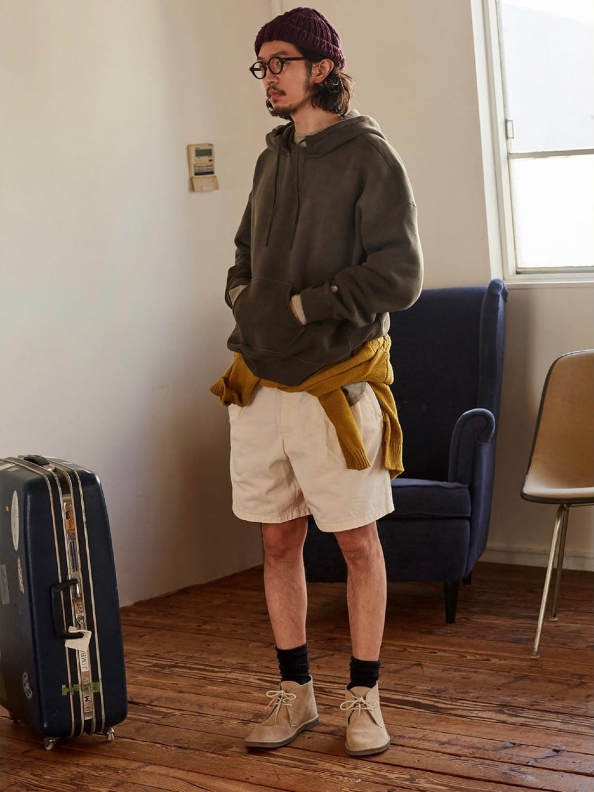 USAGE Faded Vintage Wash Hoodie in Olive - On Male Model
