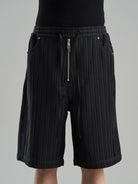 BLINDNOPLAN Textured Rivet Suit Shorts in Black - On Model
