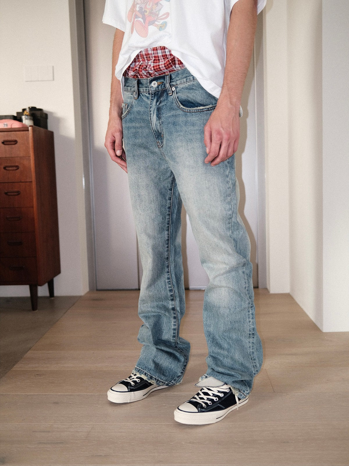 UNKNOWNWORLD Ice Blue Washed Micro Flare Jeans in Blue - On Male Model