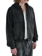 UNKNOWNWORLD Distressed Washed Zip Up Hoodie in Black - On Male Model