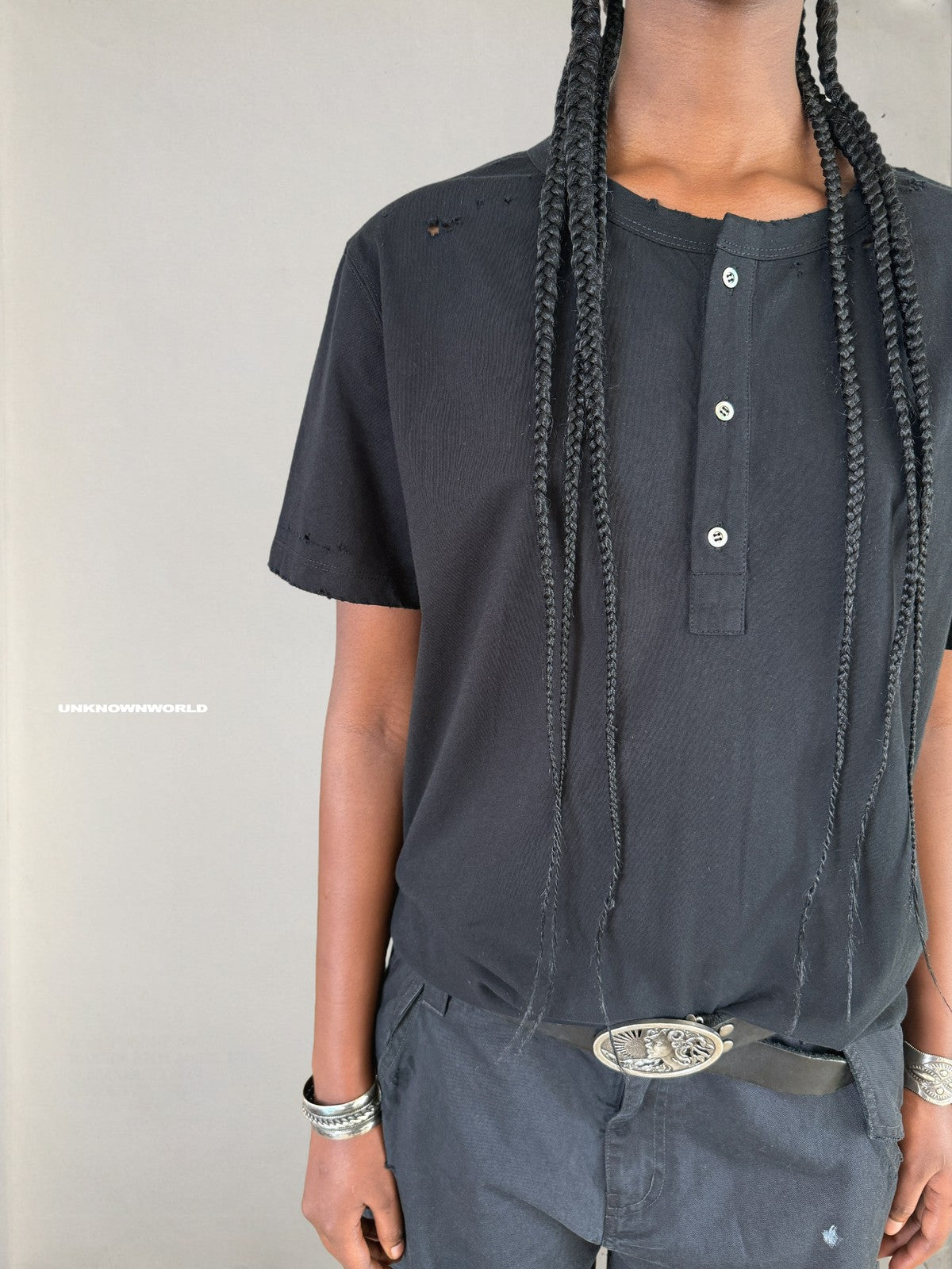 UNKNOWNWORLD Distressed Cotton Henley T Shirt in Black - On Model