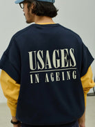 USAGE Raw Edge Cotton Short Sleeve Sweatshirt in Navy Blue - On Male Model