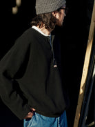 USAGE Heavyweight Waffle Knit Henley Sweatshirt in Black - On Male Model