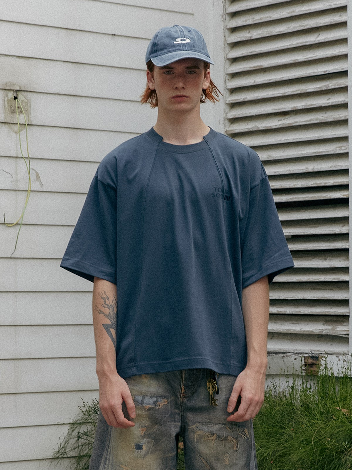SOD Deconstructed Panel Cotton T Shirt in Teal - On Male Model