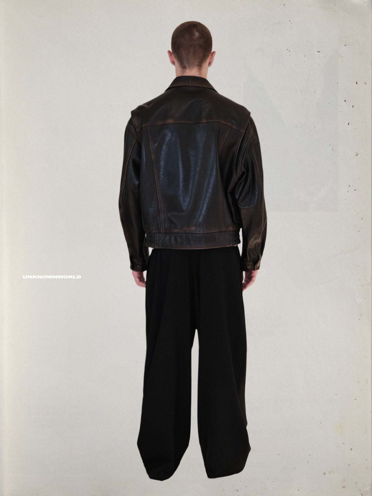 UNKNOWNWORLD Distressed Cowhide Flight Jacket in Brown - On Model