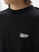 MASONPRINCE Exposed Seam Tape Print T Shirt in Black - On Male Model