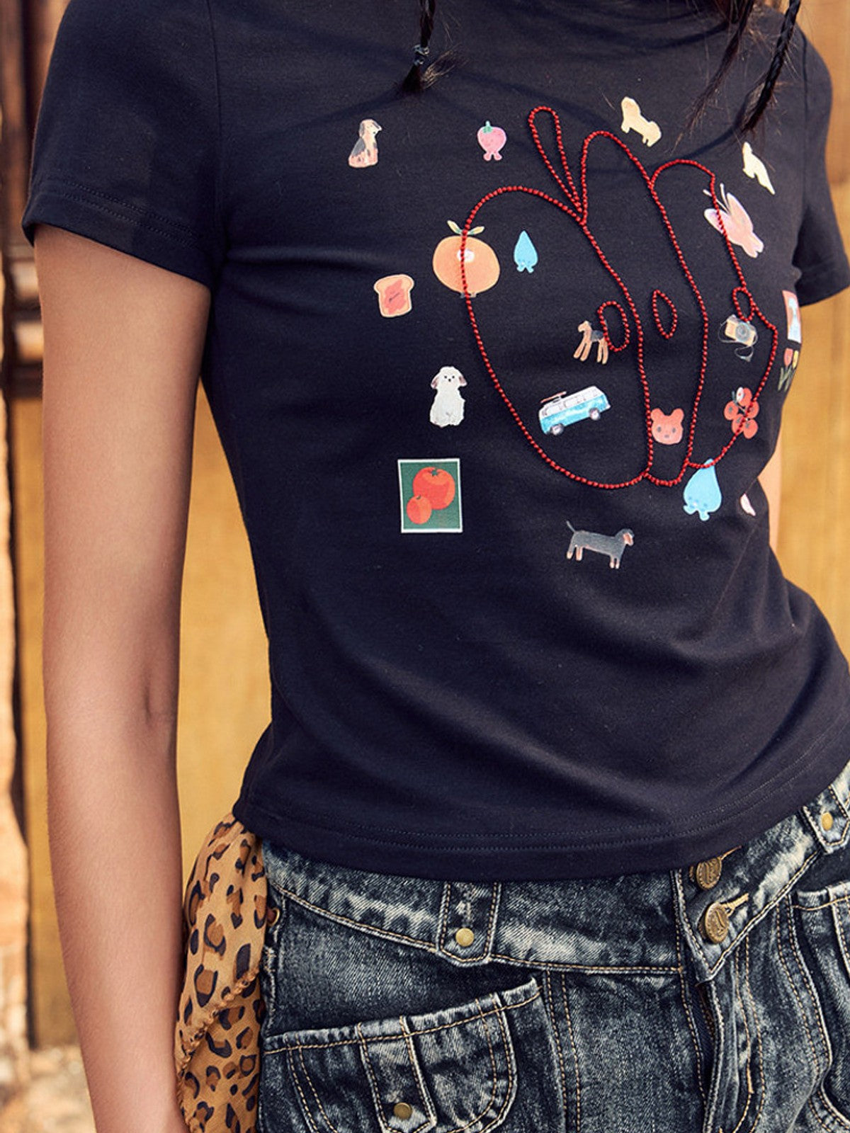 BEERBRO Embroidered Apple Crop Tee in Black - On Female Model