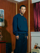 SOD Embroidered Padded Shoulder Hoodie in Blue - On Male Model