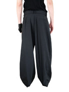 UNKNOWNWORLD Triple Pleated Wool Blend Trousers in Gray - On Model