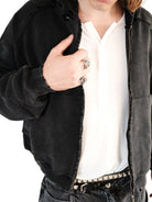 UNKNOWNWORLD Distressed Washed Zip Up Hoodie in Black - On Male Model