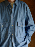 USAGE Cotton Chambray Safari Shirt in Denim - On Male Model