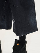 BLINDNOPLAN Ink Splatter Denim Carpenter Shorts in Black - On Model